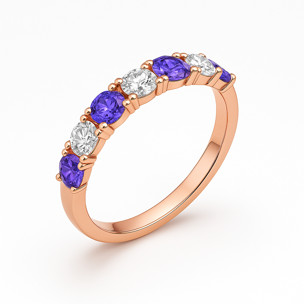 Rose gold ring with tanzanite gemstones and lab grown diamonds on a white background