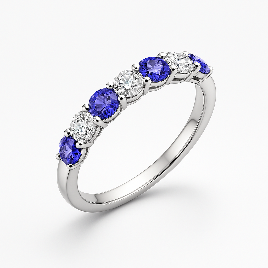 White gold ring with tanzanite gemstones and lab grown diamonds on a white background