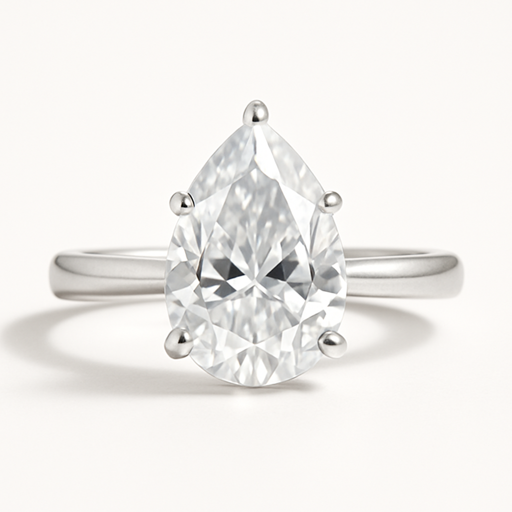 Solitaire | Pear -  Pear Pressure | She doesn’t need a ring… but all her friends have one.