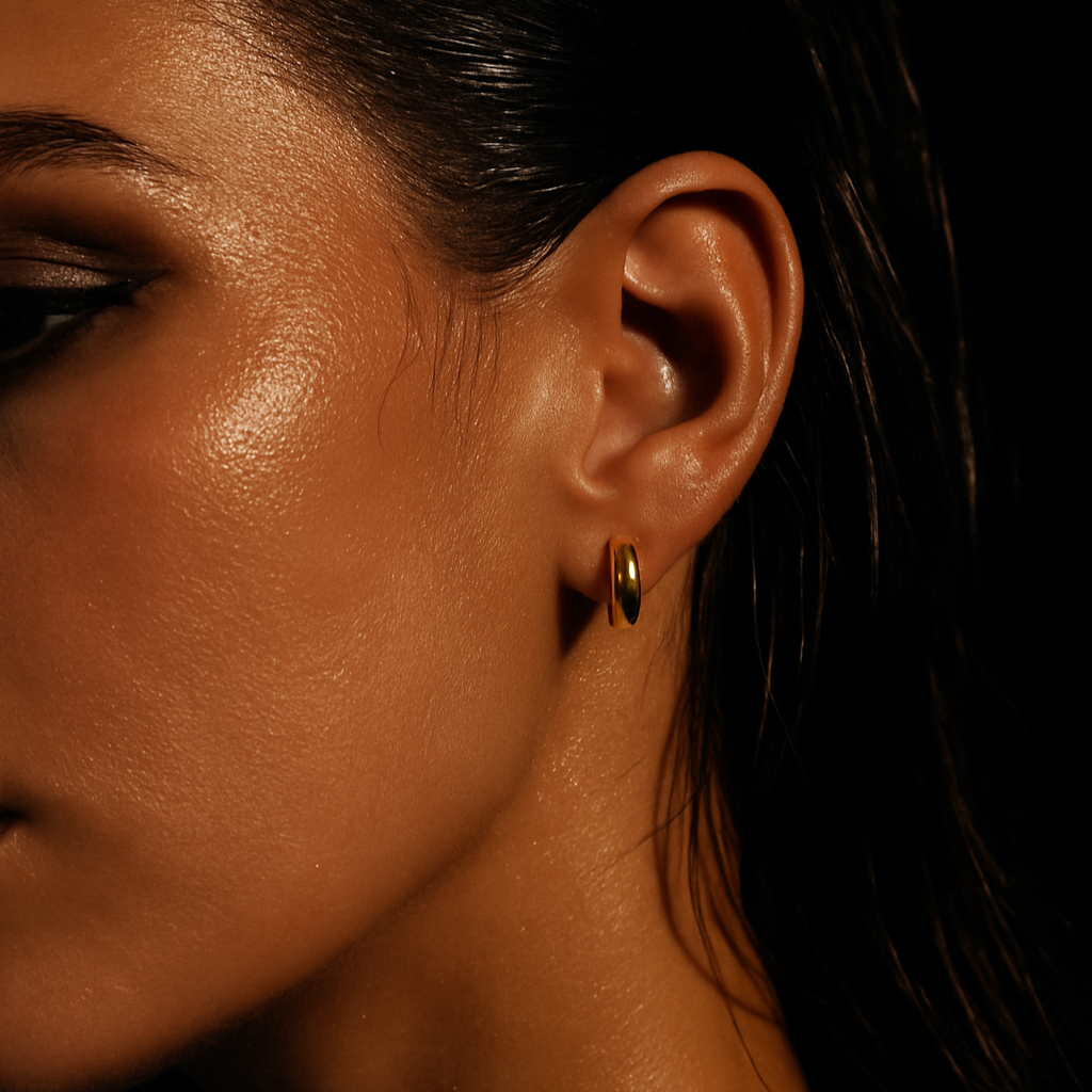 Plain huggie earrings in solid 9ct/18ct Yellow Goldby Stacked&Co — handcrafted minimalist hoops made in South Africa.