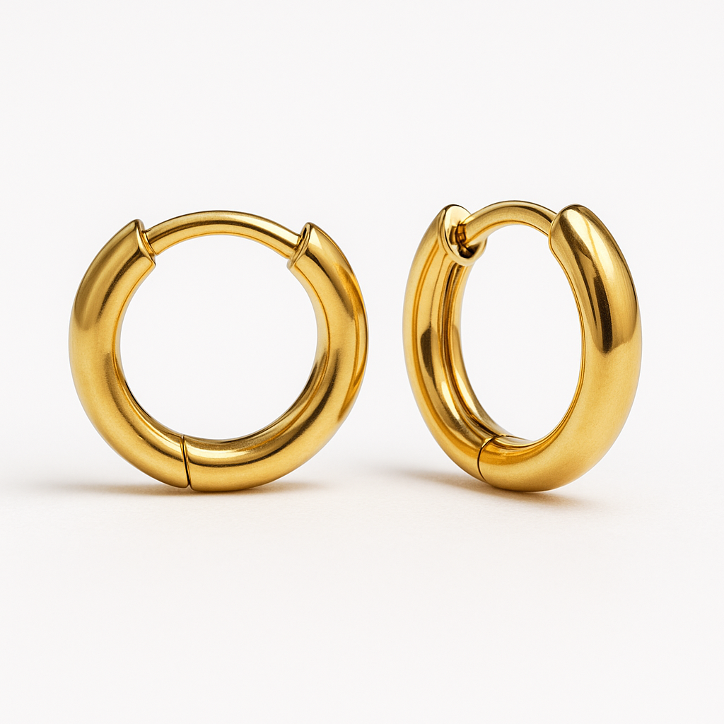 Plain huggie earrings in solid 9ct/18ct Yellow Goldby Stacked&Co — handcrafted minimalist hoops made in South Africa.